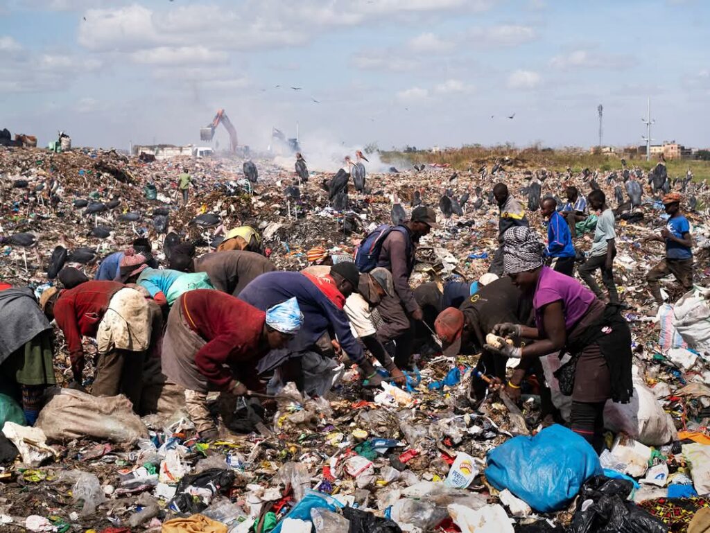 People scavenging in the Korogocho slums, Nairobi Kenya