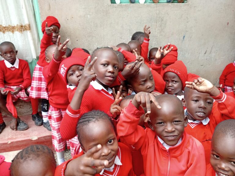 Soma Nuru kids happily outside the classrooms